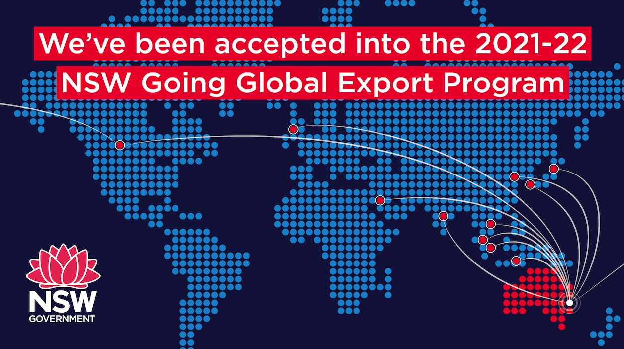A dotted world map in blue on a dark navy background with Australia picked out in red, white flight paths arcing from Sydney to markers across Asia, Europe and North America, under the words We have been accepted into the 2021-22 NSW Going Global Export Program beside the NSW Government waratah logo