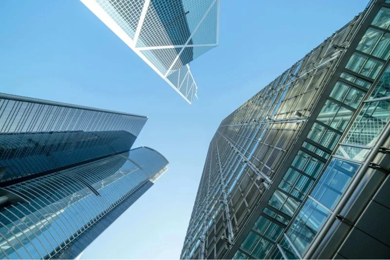 A commercial office tower seen from the footpath, the kind of building a facilities team runs